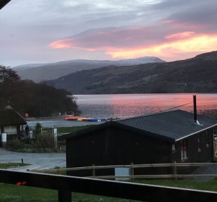 A view of the sun rise over Loch Tay.